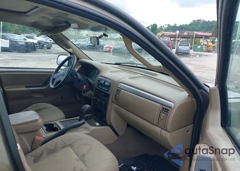 2004 Jeep Grand Cherokee Laredo z USA, uszkodzony, nr VIN 1J4GX48S84C412656